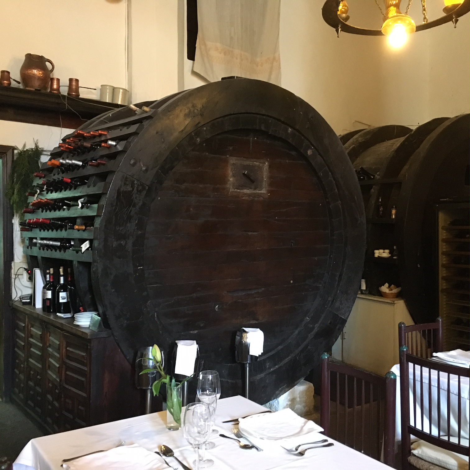 Photo Can Amer wine cask with bottles